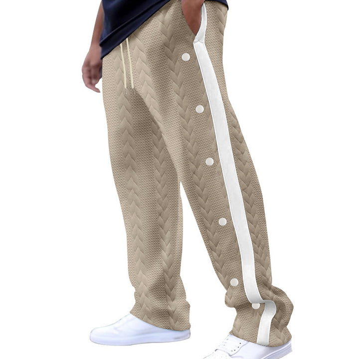 Men's breathable jogger pants with side snap buttons and unique knit design Lune London