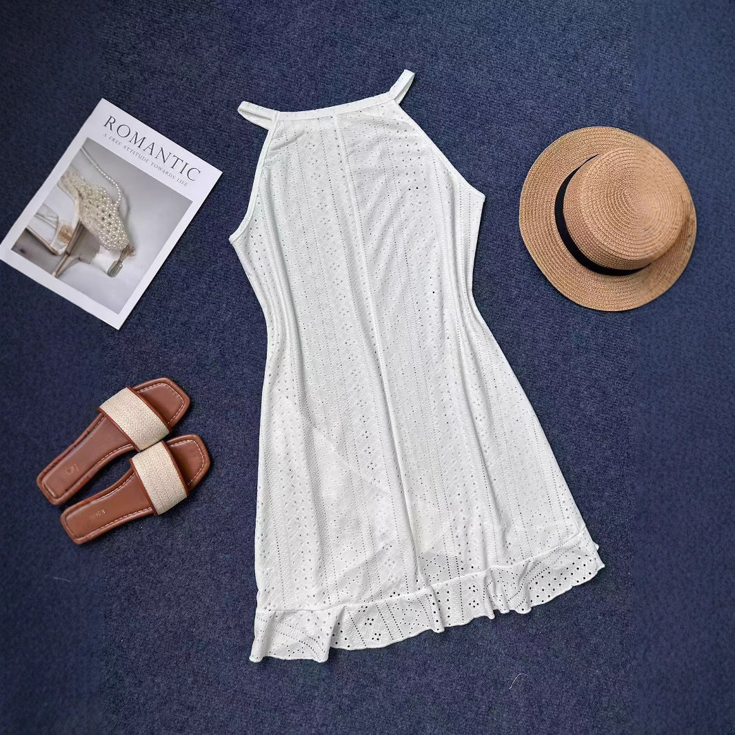 Summer beach dress for women with ruffled hem and breathable hole pattern Lune London
