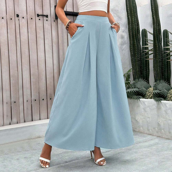 Pantalons larges Palazzo pour femmes avec des plis élégants et un design de poche pratique Chic & Stil