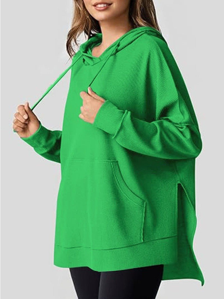 Oversized women's hoodie with side slits and practical pockets Lune London