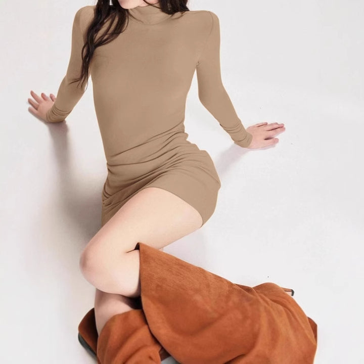 Feminine fitted dress with high collar and long sleeves Lune London