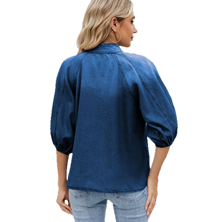Denim blouse for women with decorative knot detail and feminine puff sleeves Lune London