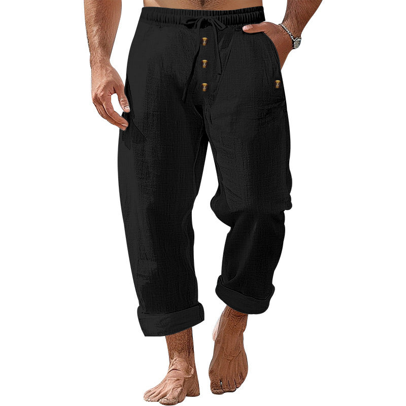 Casual beach pants for men with elastic waistband and practical button details Lune London