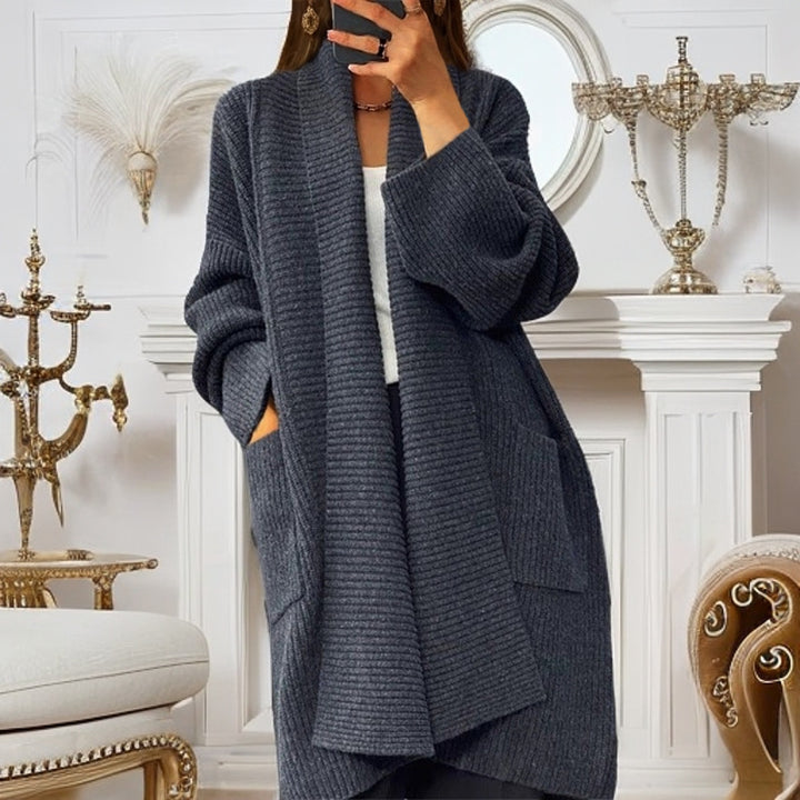 Long knitted coat for women with textured design and pockets Lune London