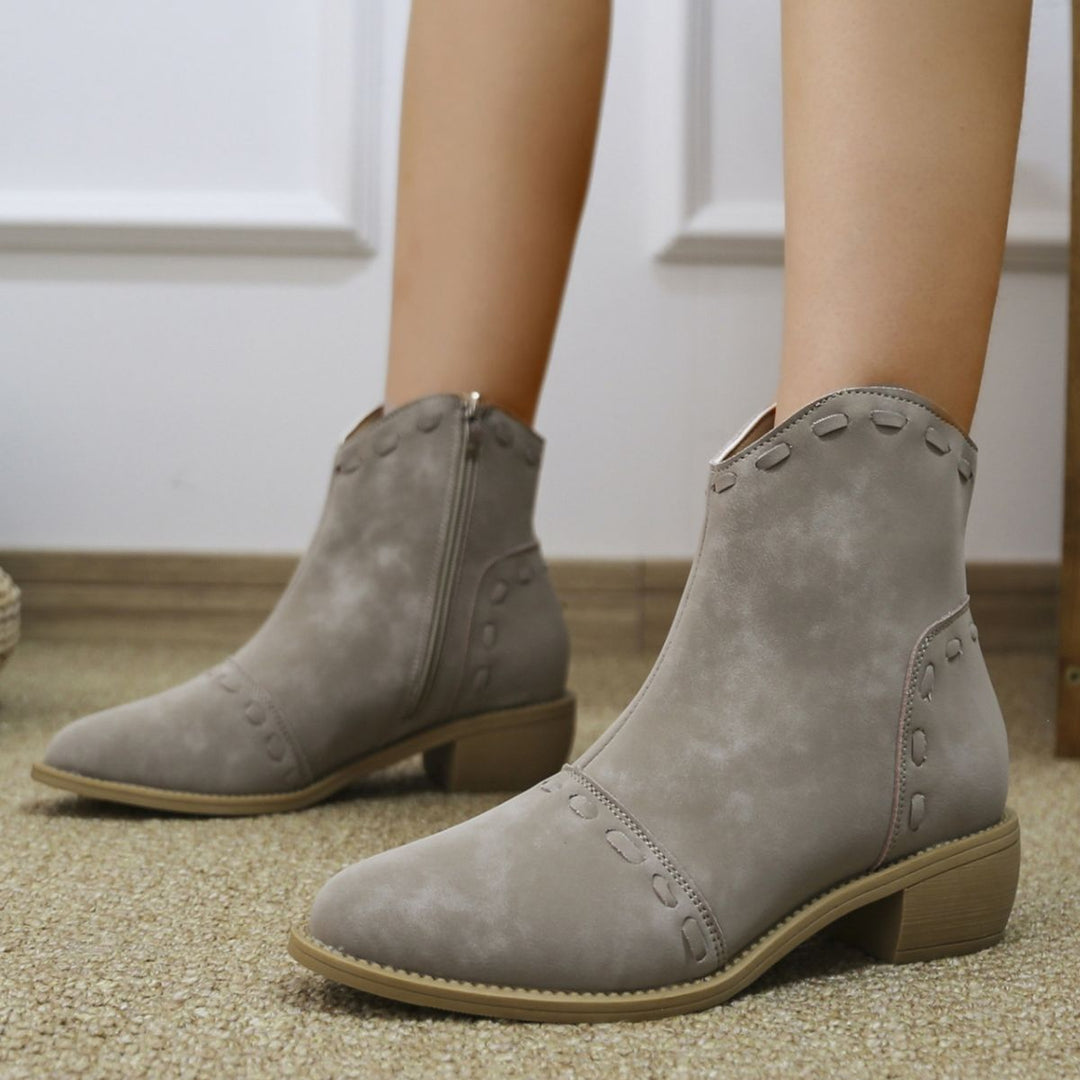 Elegant ankle boots for women with trendy decorative stitching and a practical zipper Lune London