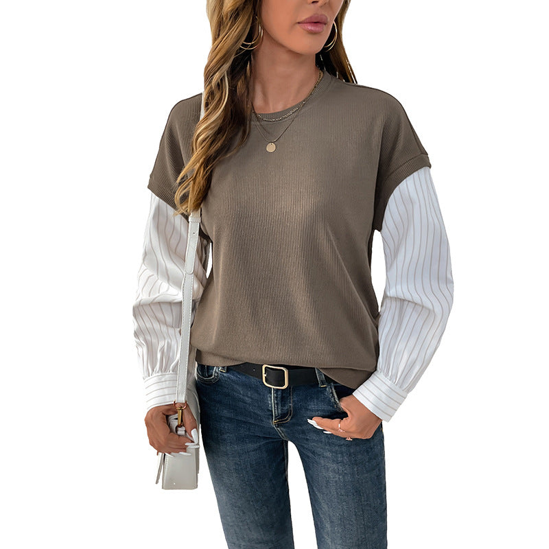 T-shirt féminin à la mode avec un look superposé créatif et des manches roulées élégantes Chic & Stil