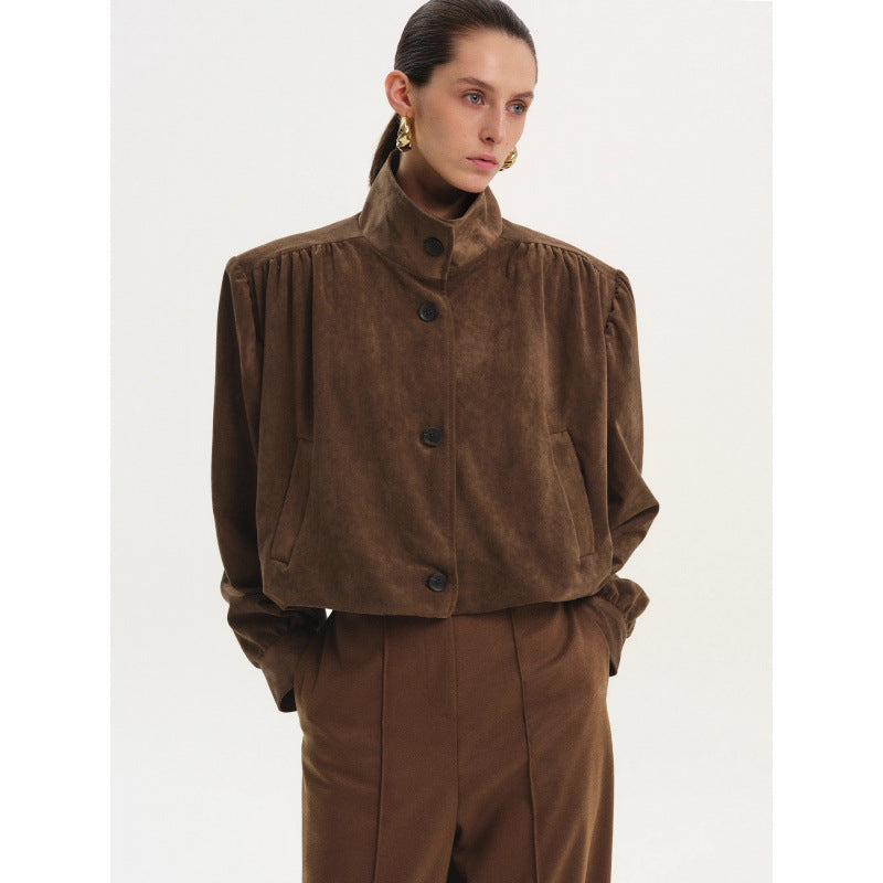 Veste élégante pour femmes avec des manches bouffantes texturées et un détail de bouton Lune London