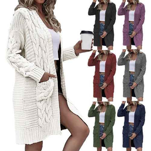 Ladies chunky knit cardigan with deep pockets and elaborate braids design Lune London