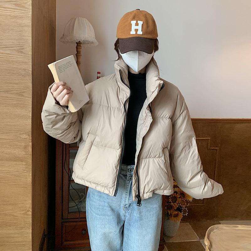 Short puffer jacket for women with high collar and side pockets Lune London