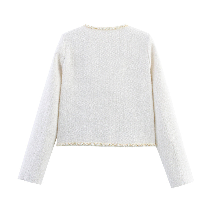Trendy boucle jacket for ladies with elegant pockets and pearl embellished buttons Lune London