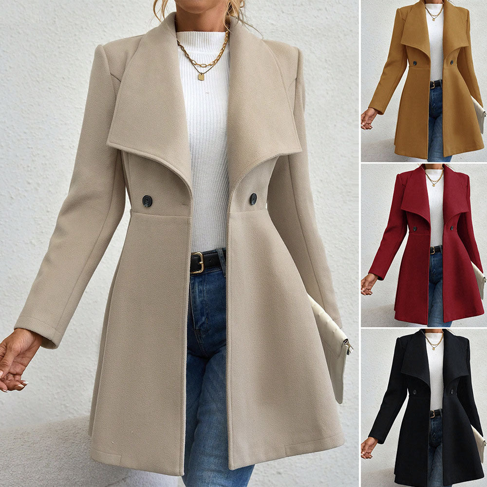 Ladies elegant wool coat with a loose and cinched silhouette and modern button details Lune London