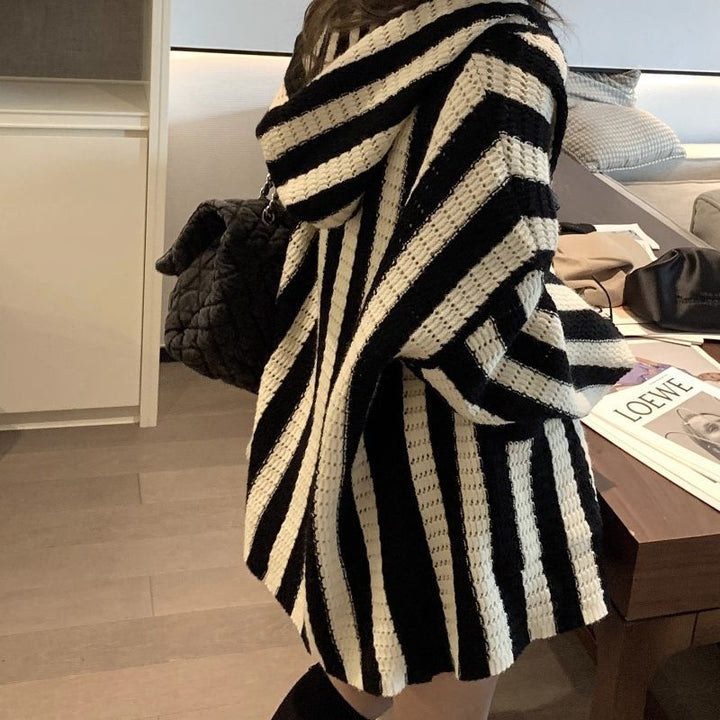 Ladies oversized knit poncho with graphic stripe pattern Lune London
