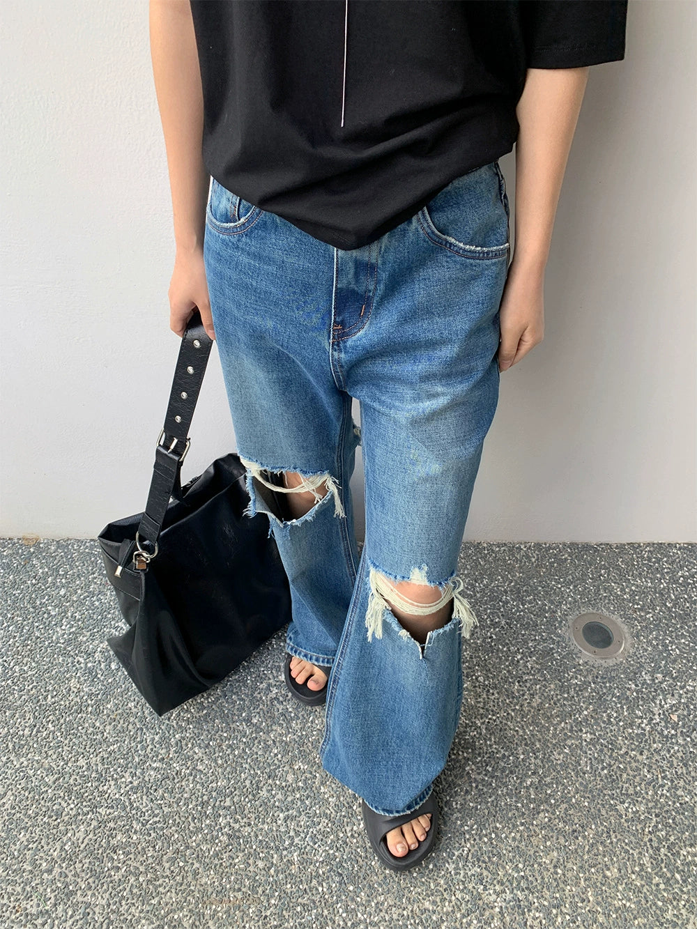 Women’s ripped wide jeans with cut-out details Lune London