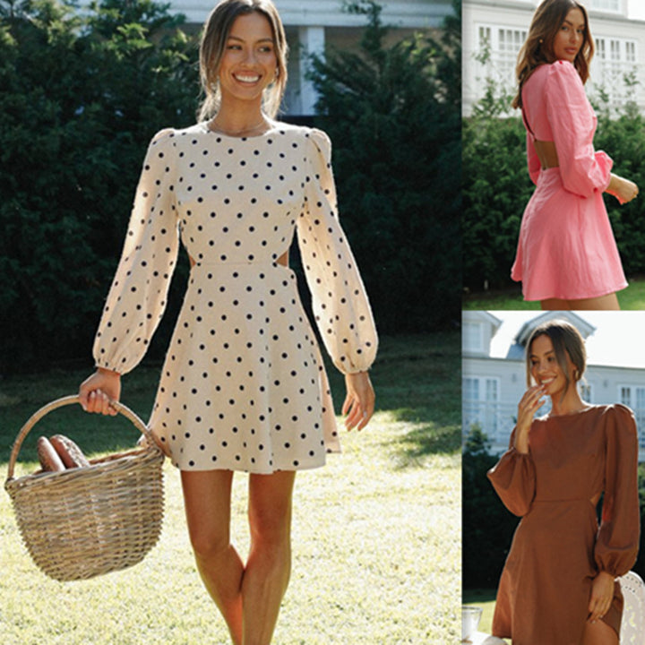 Robe minnie à pois pour femmes avec des manches volumineuses et une coupe ajustée Chic & Stil