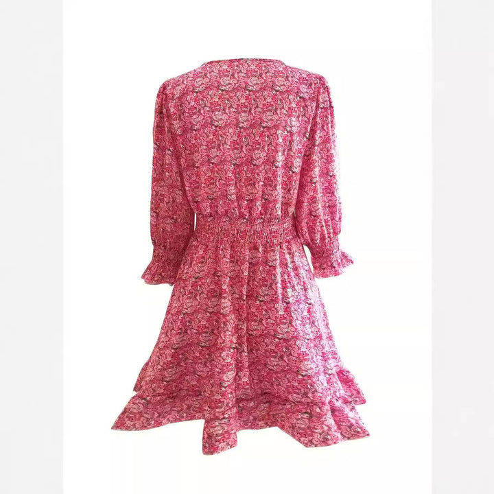Ladies Mini dress playful and elegant with deep V-neckline and ruffle details Lune London
