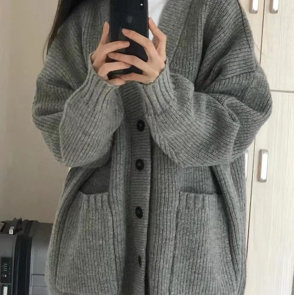 Oversized knit jacket for women with button closure and practical pockets Lune London