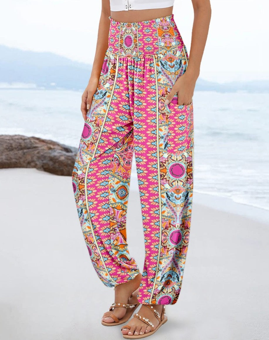 Wide Palazzo pants for women with colorful Paisley pattern and elastic waistband Lune London