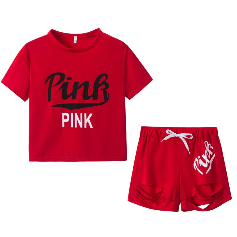 Ensemble t-shirt et short pour femmes sportif avec coupe décontractée et imprimés contrastés Chic & Stil