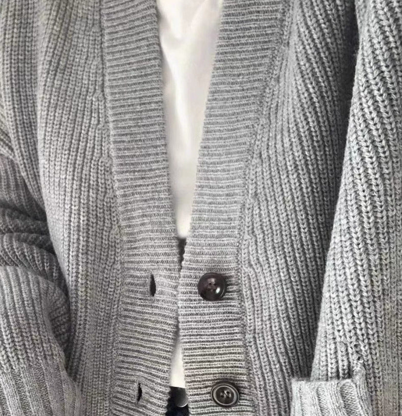 Women cardigan with decorative buttons and practical pockets Lune London