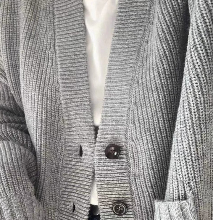 Women cardigan with decorative buttons and practical pockets Lune London