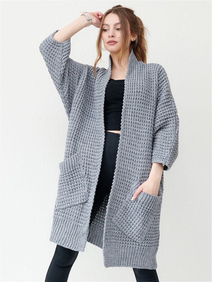 Ladies chunky knit cardigan with open fronts and practical pockets Lune London