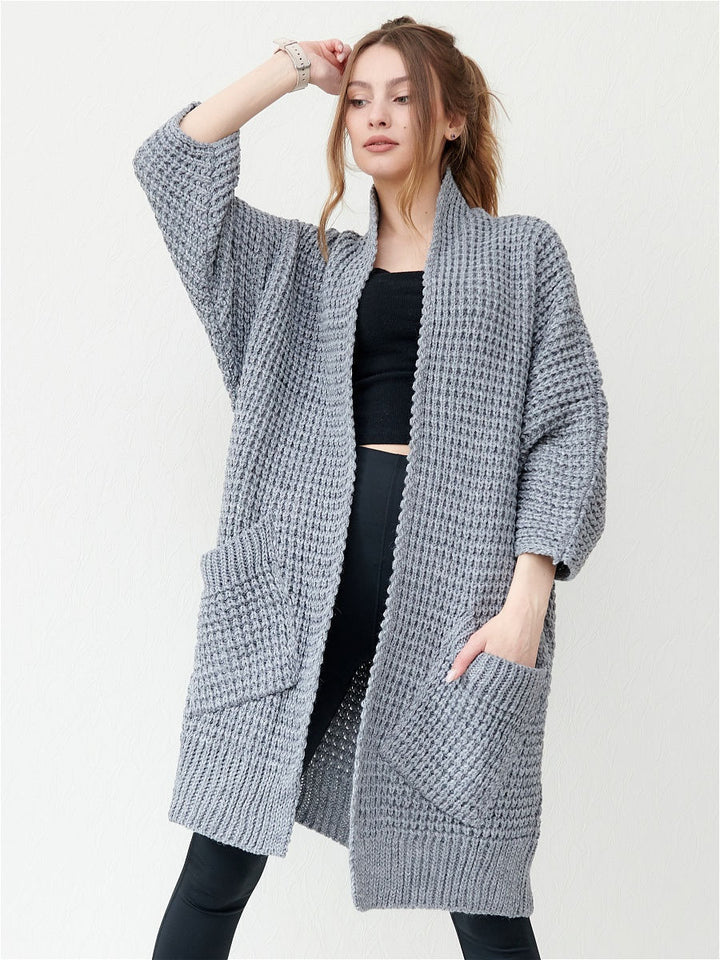 Ladies chunky knit cardigan with open fronts and practical pockets Lune London