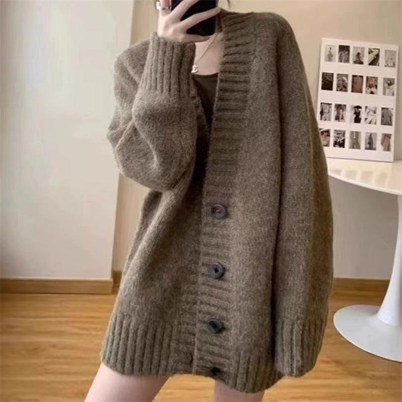 Ladies chunky knit cardigan with voluminous sleeves and buttoned neckline Lune London