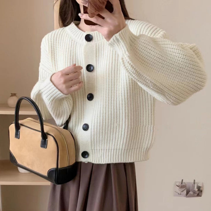 Buttoned design knit jacket for women with puff sleeves Lune London