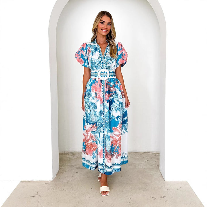 Elegant maxi dress for women with floral patterns and voluminous sleeves Chic & Stil