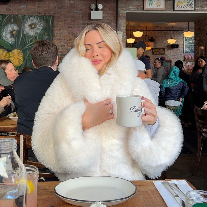 Faux fur jacket for women with a luxurious hood design Lune London