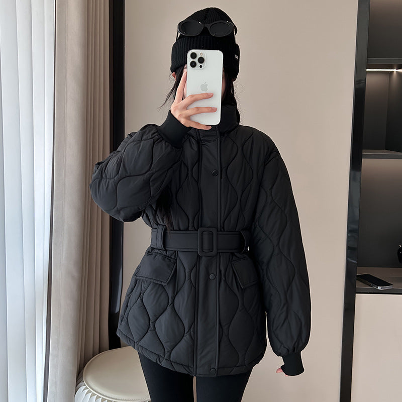 Fashion quilted jacket for women with a belted waist and practical pockets Lune London