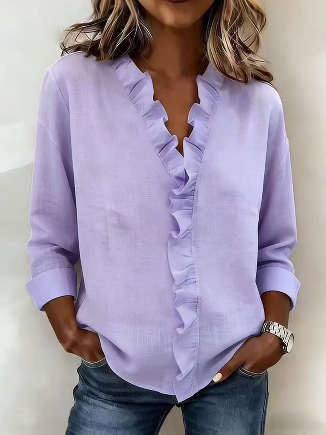 Women's romantic blouse with ruffle details and V-neck Lune London