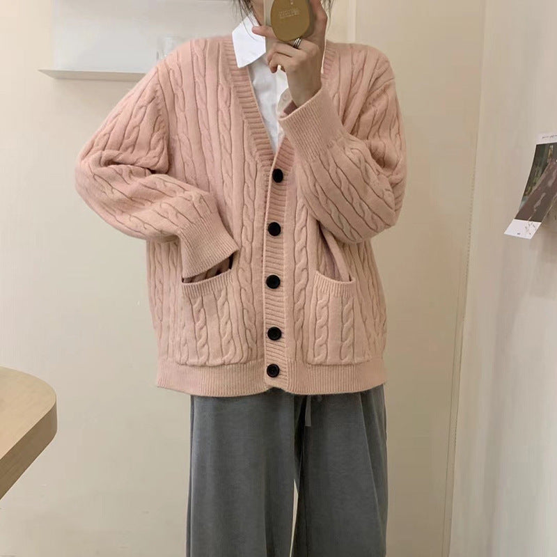 Ladies chunky knit vest with clover pattern and practical pockets Lune London