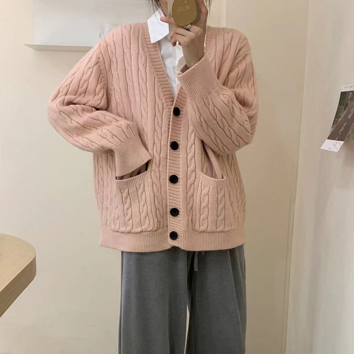 Ladies chunky knit vest with clover pattern and practical pockets Lune London