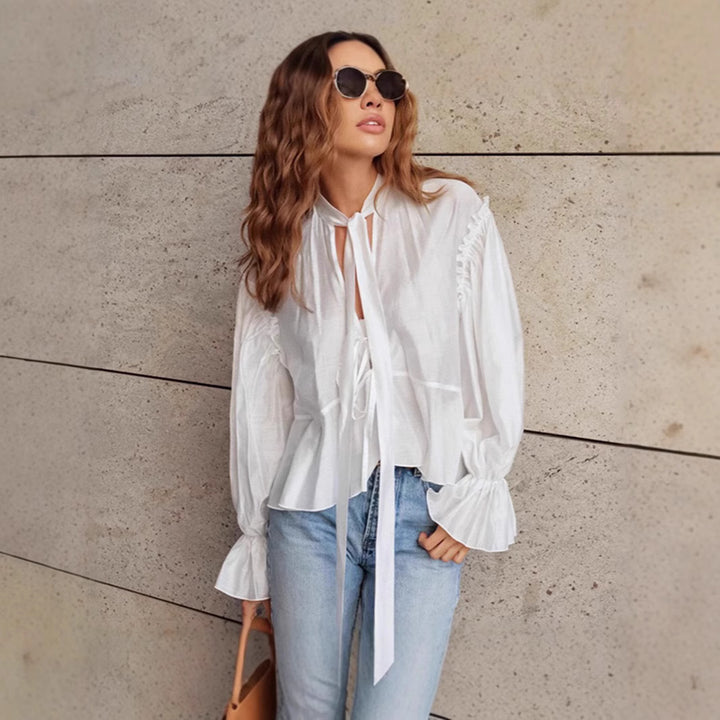 Fluid blouse for women with ruffles and a bow detail Chic und Stil