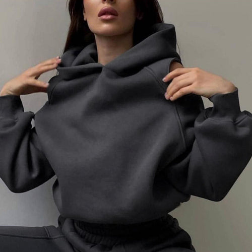 Ensemble de sport féminin avec décolleté plongeant et manches raglan latérales Chic & Stil