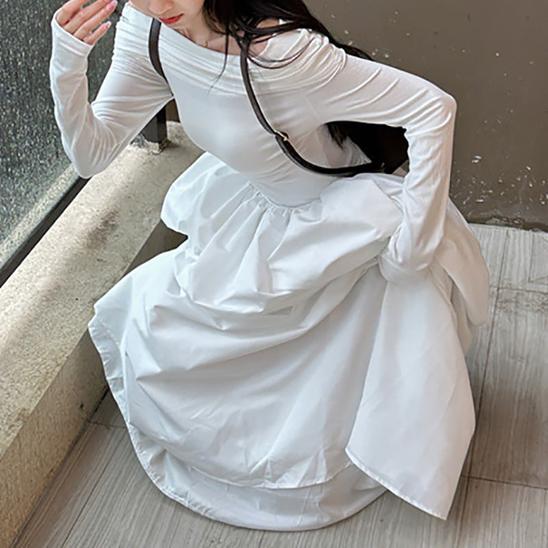 Women's elegant off-shoulder maxi dress with modern strap details Lune London
