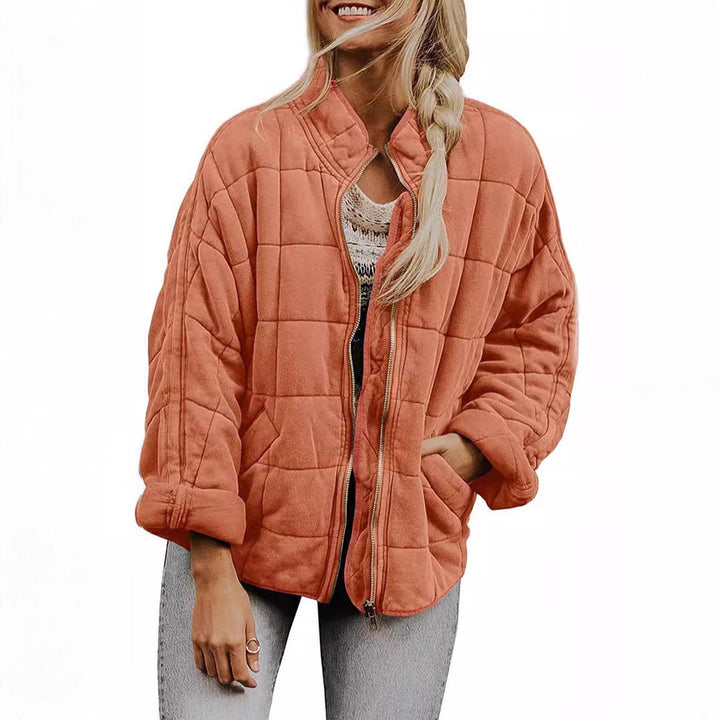 Ladies quilted jacket with high collar and practical pockets Lune London