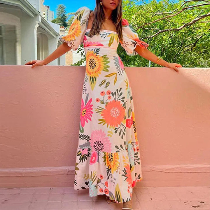 Robe maxi femme avec manches bouffantes et détails imprimés floraux Chic & Stil