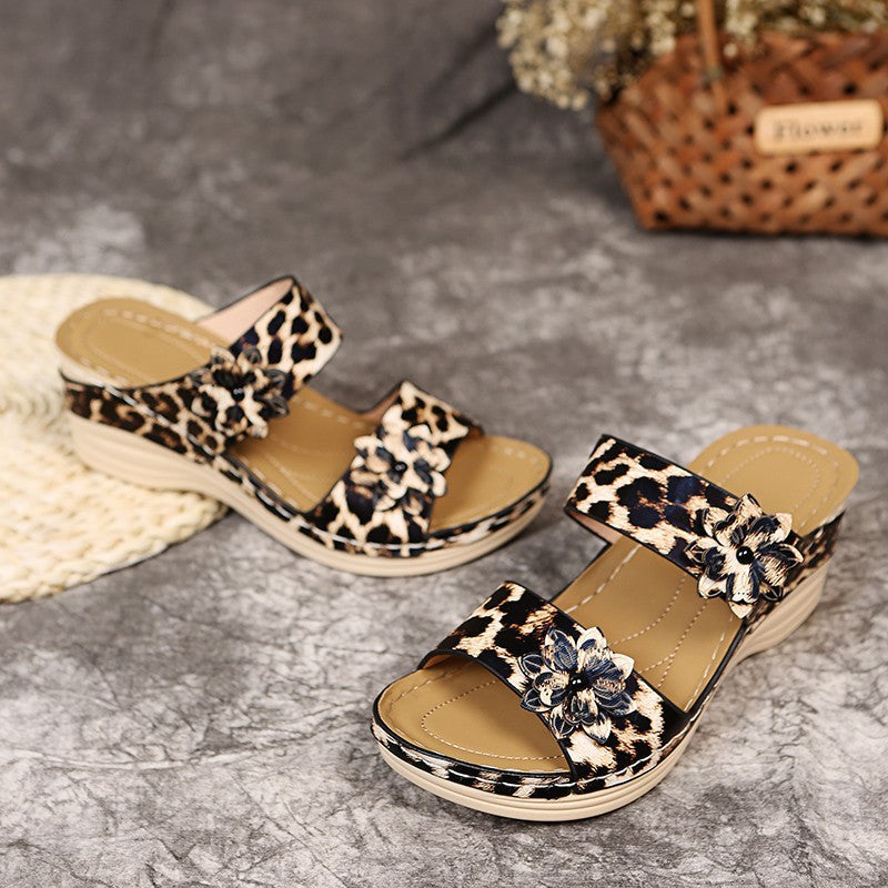 Comfortable wedge sandals for women with floral appliqués and elastic straps Lune London