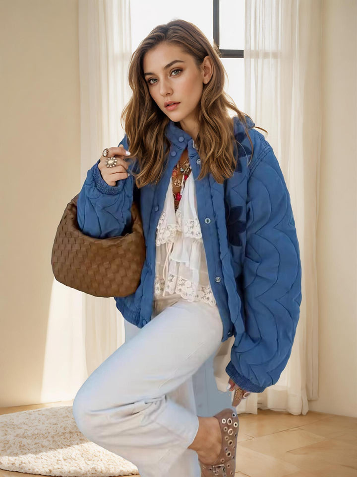 Quilted transition jacket for women with embroidered floral design Lune London