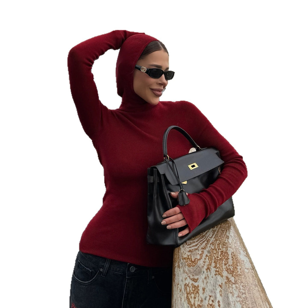 Women's fitted long sleeve top with high collar and thumb openings Lune London