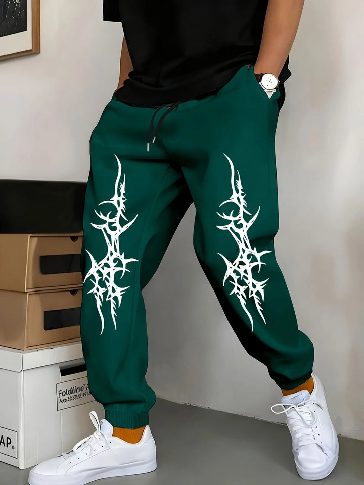 Men's Relaxed Fit Jogging Pants with Eye-Catching Graphic Design Chic & Stil
