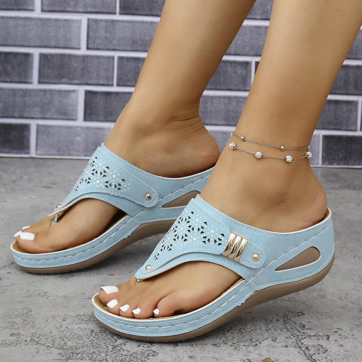 Comfortable flip-flop sandals for women with an airy look in perforated pattern Lune London