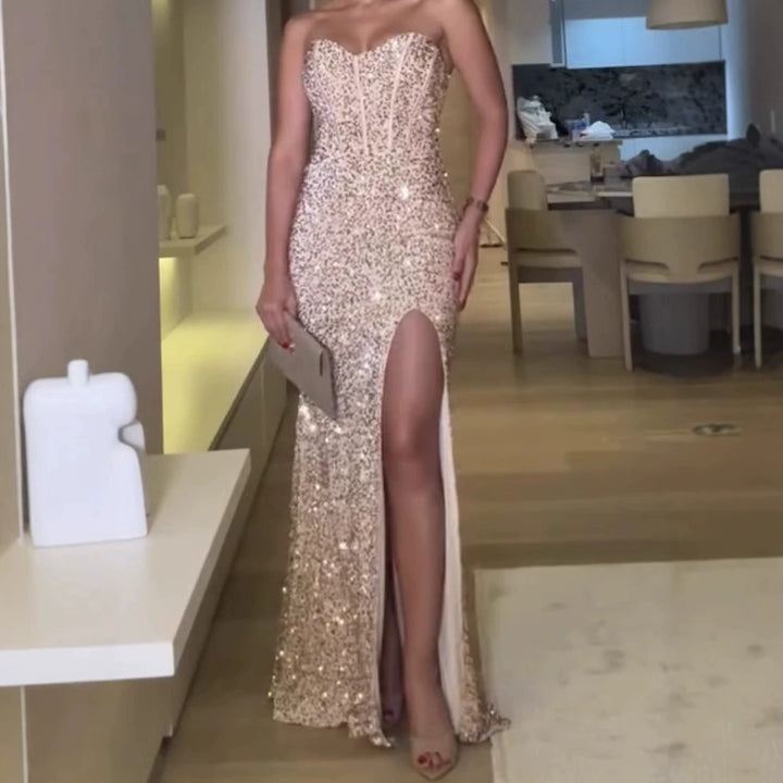 Women's glamorous evening dress with off-shoulder design and shimmering sequins Lune London