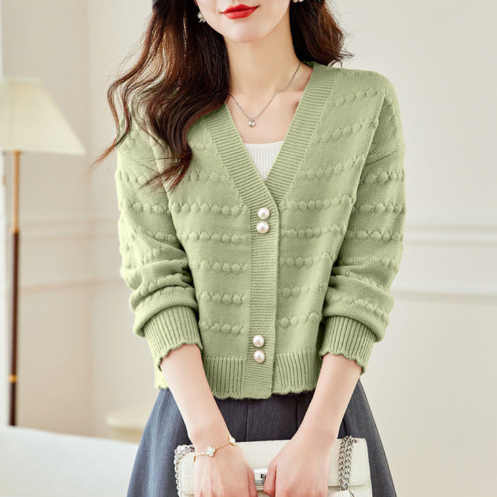 Ladies comfortable knit jacket with pearl adorned buttons and structured design Lune London