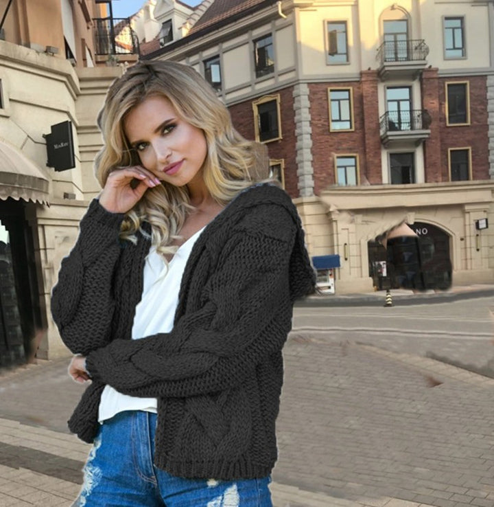 Women's knitted jacket with hood and modern braiding pattern Lune London