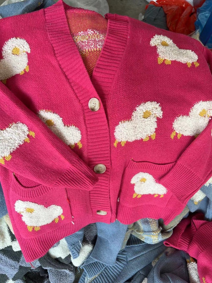 Women’s knit jacket with playful sheep pattern and pockets Lune London