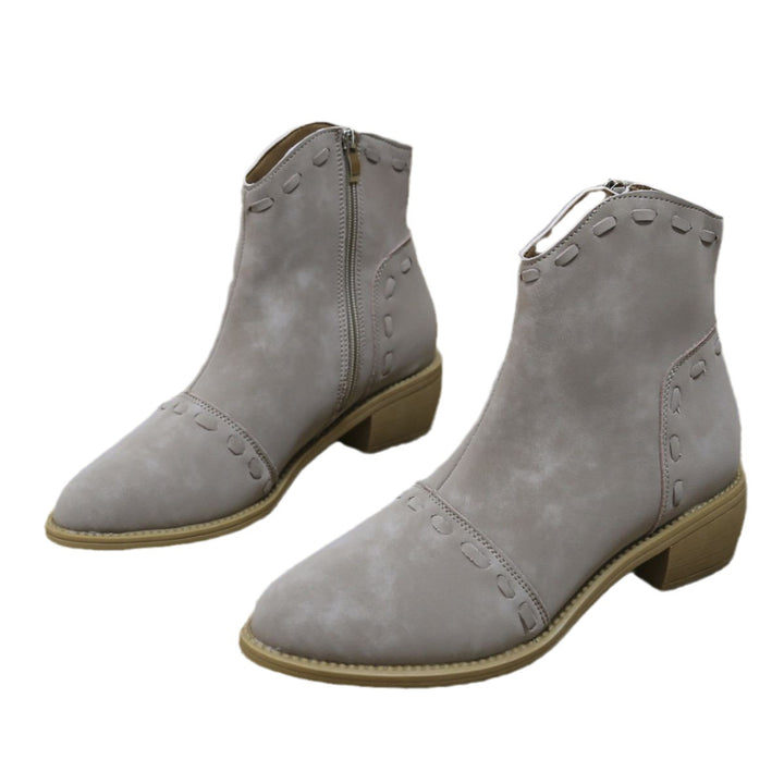 Elegant ankle boots for women with trendy decorative stitching and a practical zipper Lune London