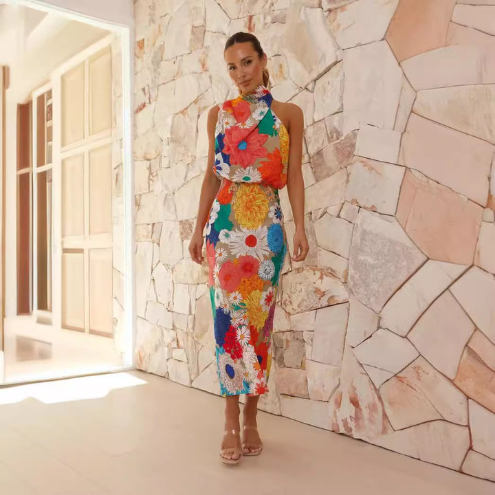 Ladies max dress with creative floral design and playful neckholder